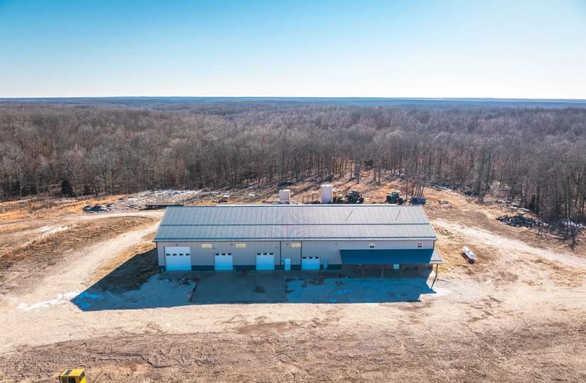 Exceptional Commercial Opportunity with Living Quarters on 15 Acres for Sale – Camden County