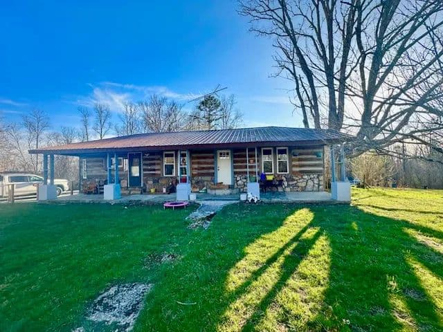 8.9-Acre Beautiful Log-Sided Home in Crawford, TN for Sale - No Restrictions!