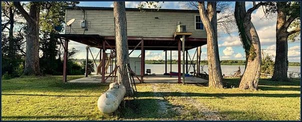 Lake House in Bolivar County at 39 Greenwood Miller Road in Beulah, MS