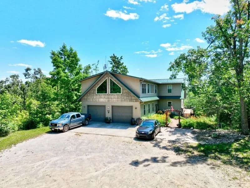 261-Acre Michigan Hunting Retreat with Luxury, Lodge-Style Estate for Sale