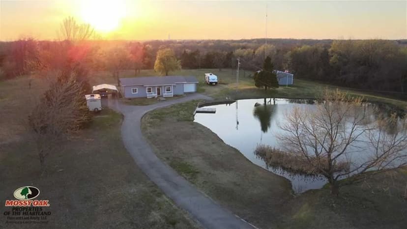 Tranquil Pond with House on 4.7+/- Acres